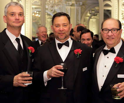 Three Men Wearing Black Suits